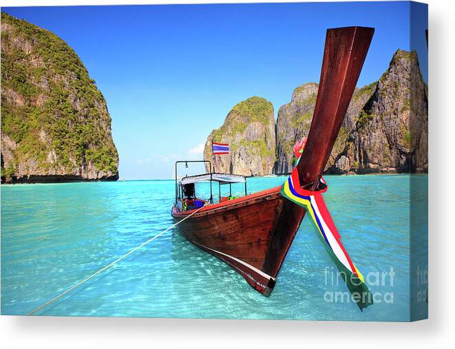 Phi Phi Island Canvas Print featuring the photograph Longtail boat at Maya bay by MotHaiBaPhoto Prints