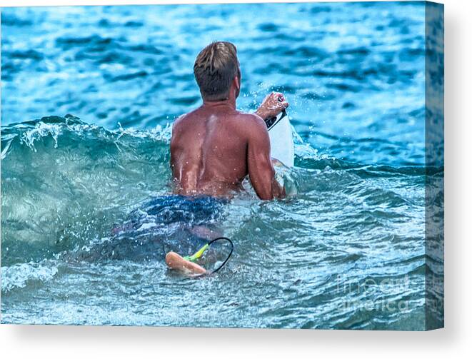A Surfer Waits And Looks For The Next Wave To Ride. Canvas Print featuring the photograph In The Lineup by Eye Olating Images