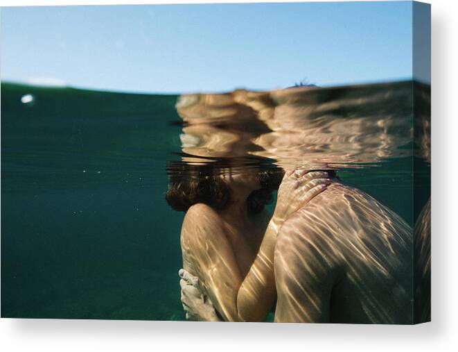 Swim Canvas Print featuring the photograph Love Kiss by Gemma Silvestre