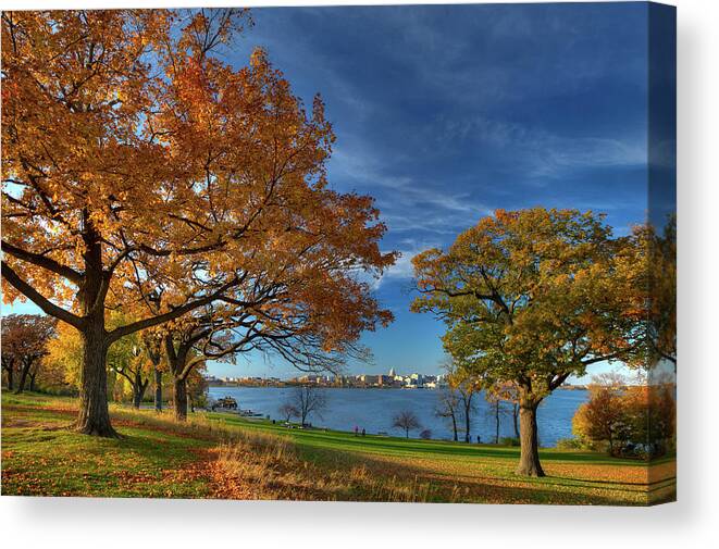 Olin Park Madison Wi Autumn Lake Monona Wisconsin Lake Fall Color Blue Yellow Capitol Canvas Print featuring the photograph Madison across Lake Monona in Autumn Splendor from Olin Park by Peter Herman