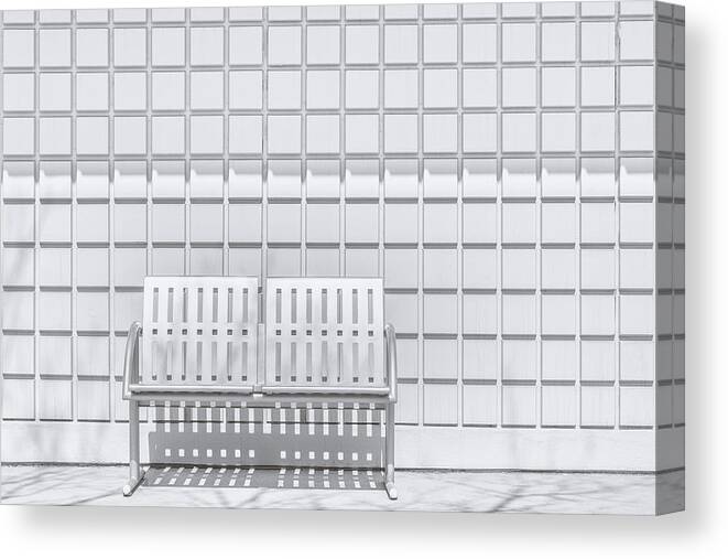 Bench Canvas Print featuring the photograph Metal Bench Against Concrete Squares by Scott Norris