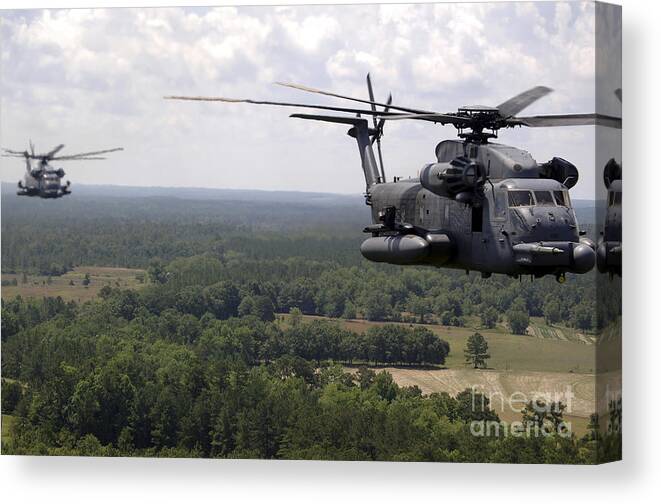 Formation Canvas Print featuring the photograph Mh-53 Pave Low Helicopters by Stocktrek Images