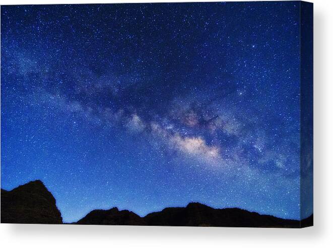 Stars Canvas Print featuring the photograph Milky Way from Polihale Kauai Hawaii by Lawrence Knutsson