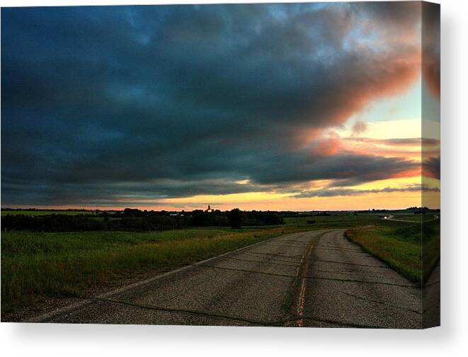 Rain Thunder Wet Drops Elevator Terminal Hay Canola Rape Sunset Evening Trail Wagon Covered Wagon Clouds Storms Elevator Grain  Sunset Canvas Print featuring the photograph Mixed Weather by David Matthews