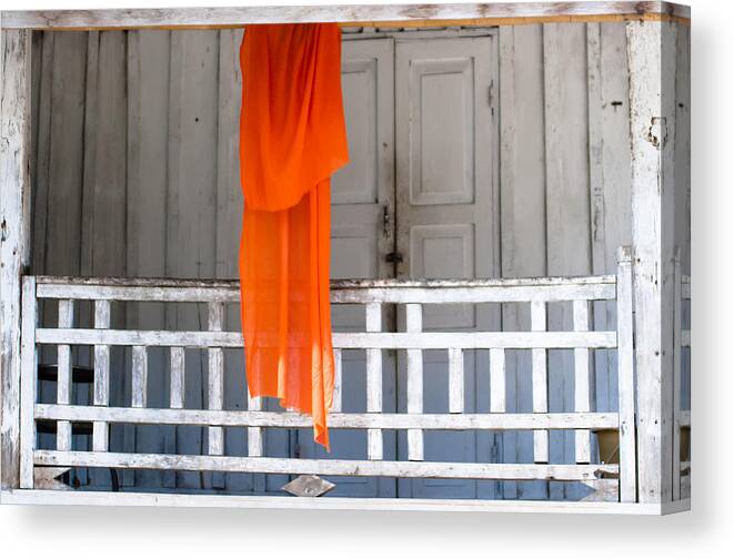 Alms Canvas Print featuring the photograph Monk's robe hanging out to dry, Luang Prabang, Laos by Neil Alexander Photography