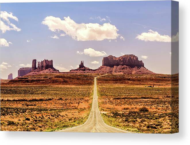 Monument Valley Canvas Print featuring the photograph Monument Valley by Winnie Chrzanowski