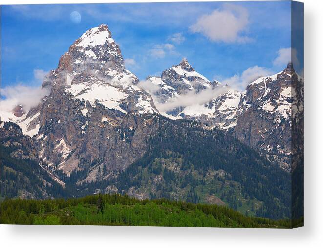 Moon Canvas Print featuring the photograph Moon Over the Tetons by Darren White