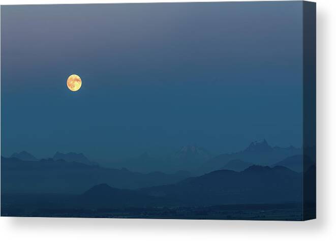 Moon Canvas Print featuring the photograph Moon Rising over the North Cascades by Michael Russell