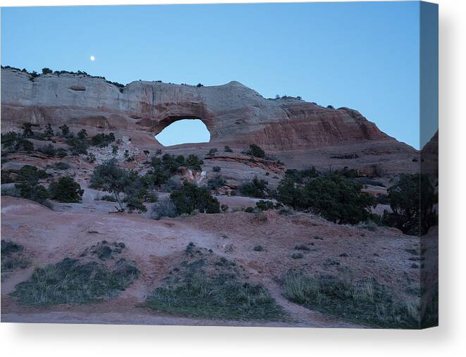 Wilson Arch Canvas Print featuring the photograph Moonrise Over Wilson Arch by Tom Cochran