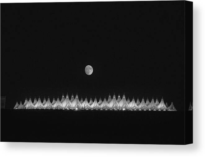 Dia Sunrise Canvas Print featuring the photograph Moonset Over DIA by Kristal Kraft
