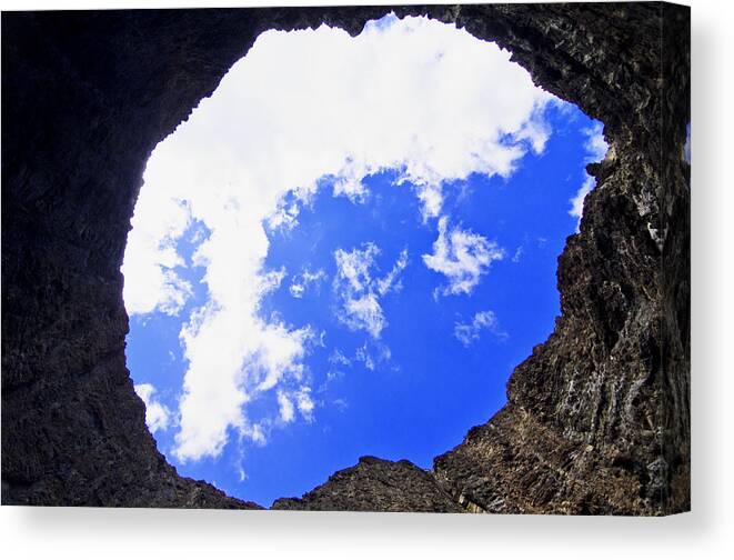 Sea Canvas Print featuring the photograph Na Pali Sea Cave Kauai Hawaii by Lawrence Knutsson