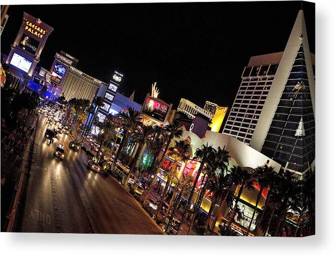 Las Vegas Canvas Print featuring the photograph Night Time in Vegas by Deborah Penland