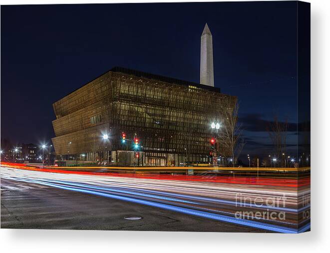 Clarence Holmes Canvas Print featuring the photograph NMAAHC and Traffic Light Trails I by Clarence Holmes