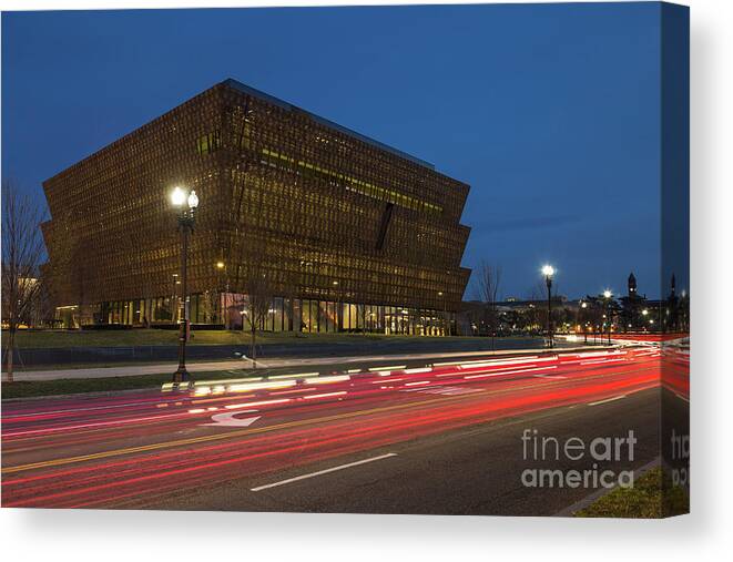 Clarence Holmes Canvas Print featuring the photograph NMAAHC and Traffic Light Trails II by Clarence Holmes
