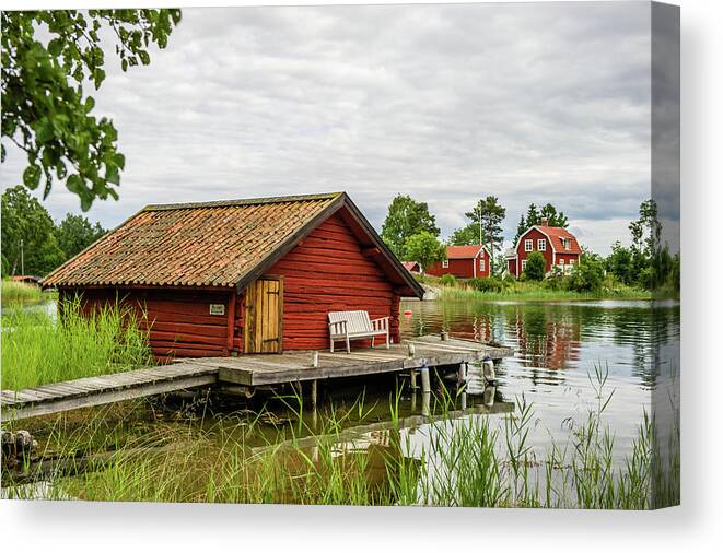 The Old Boathouse Canvas Print featuring the photograph Old boathouse by Torbjorn Swenelius