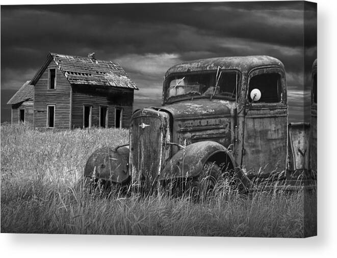 Landscape Canvas Print featuring the photograph Old Vintage Pickup in Black and White by an Abandoned Farm House by Randall Nyhof