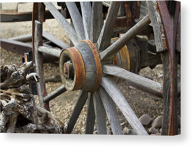 Wheel Canvas Print featuring the photograph Old Waagon Wheel by Phyllis Denton