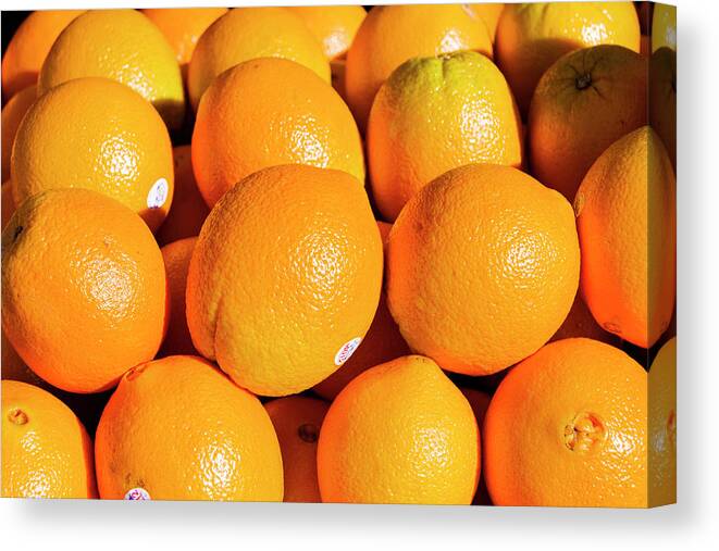 Fruit Canvas Print featuring the photograph Oranges by Daniel Murphy