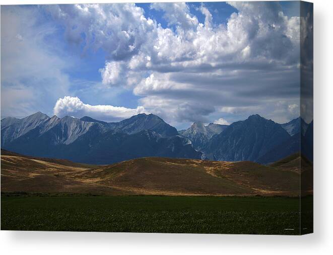 Montana Mountains Canvas Print featuring the photograph Pause And Reflect by Joseph Noonan