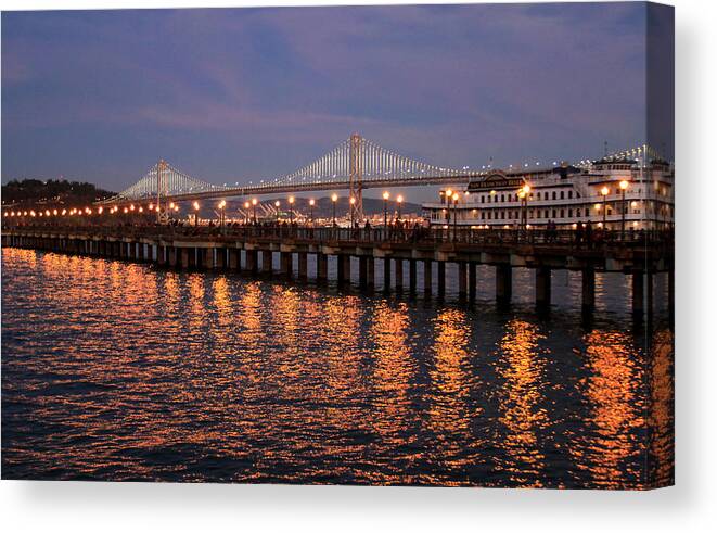 Bonnie Follett Canvas Print featuring the photograph Pier 7 and Bay Bridge Lights at Sunset by Bonnie Follett
