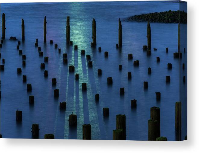 Abstract Canvas Print featuring the photograph Pilings and Ship Light by Robert Potts