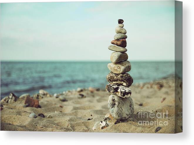 Stones Canvas Print featuring the photograph Poised by Hannes Cmarits