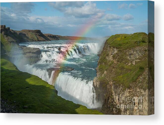 Golden Falls Canvas Print featuring the photograph Rainbow at Gullfoss Iceland by Michael Ver Sprill