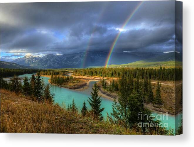 Rainbows On The Athabasca Canvas Print featuring the photograph Rainbows on the Athabasca River Jasper National Park by Wayne Moran