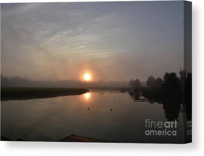 Reflections Canvas Print featuring the photograph Reflections of the Sunshine Burning through the Fog at Sunrise by DejaVu Designs