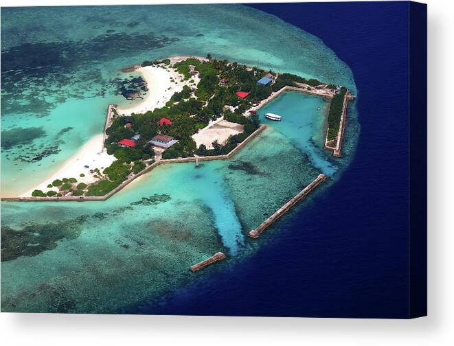 Jenny Rainbow Fine Art Photography Canvas Print featuring the photograph Resort in the Ocean 2. Aerial Journey around Maldives by Jenny Rainbow