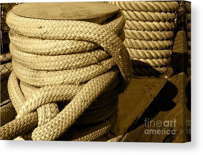 Rope Canvas Print featuring the photograph Rope tied to a large ship by Micah May