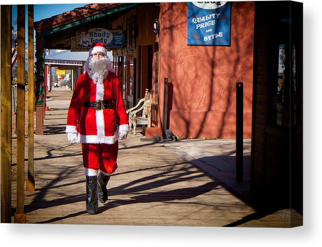Arizona Canvas Print featuring the photograph Santa Claus is Coming to Town in Tombstone Arizona by Mary Lee Dereske