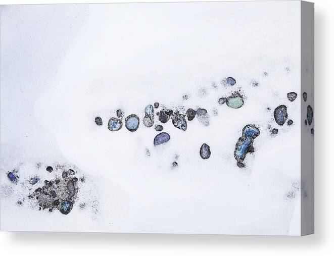 Theresa Tahara Canvas Print featuring the photograph Snow Pebbles Left by Theresa Tahara
