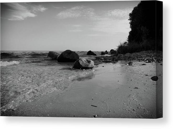 Harrington Beach State Park Canvas Print featuring the photograph Solitude On The Beach As Day Ends by Janice Adomeit