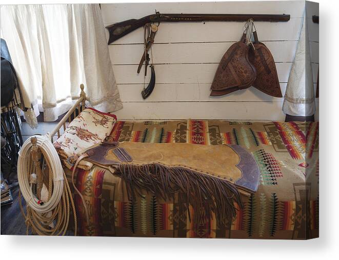 Texas Canvas Print featuring the photograph Some genuine Old West articles displayed inside a bunkhouse by Carol M Highsmith