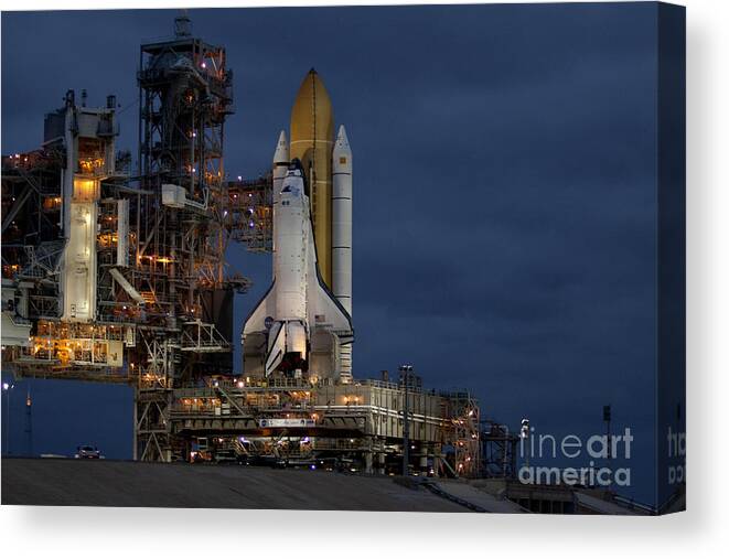 Nasa Canvas Print featuring the photograph Space Shuttle Discovery by NASA/Amanda Diller