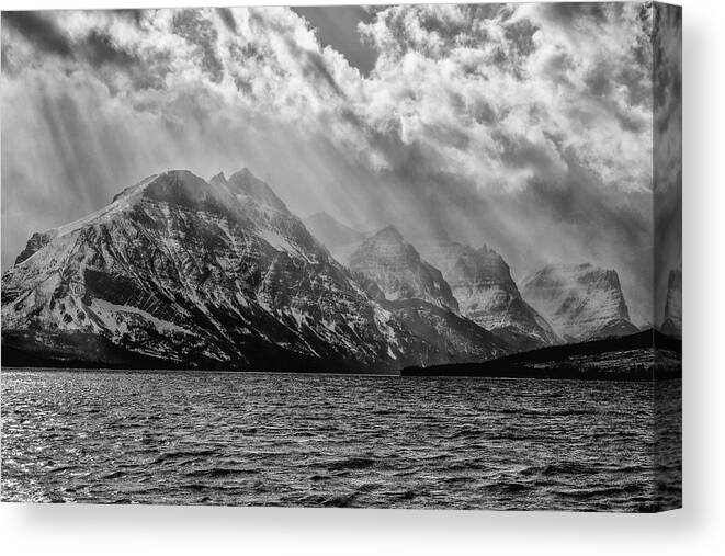 Light Rays Canvas Print featuring the photograph St Mary storm, Glacier National Park by Greg Wyatt
