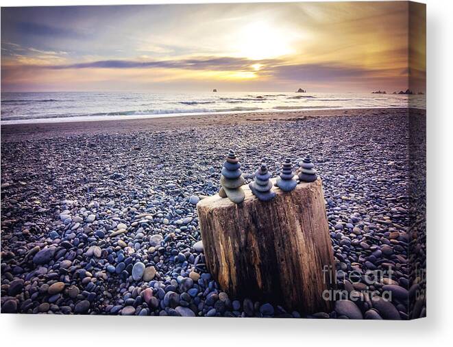 Rocks Canvas Print featuring the photograph Stacked Rocks at Sunset by Joan McCool