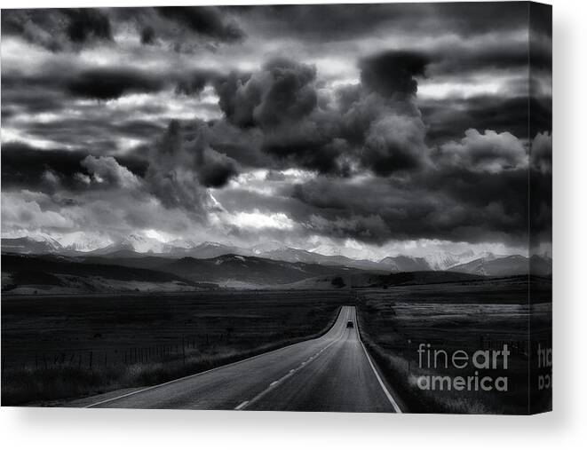 Black And White Canvas Print featuring the photograph Storm Rider by Lauren Leigh Hunter Fine Art Photography