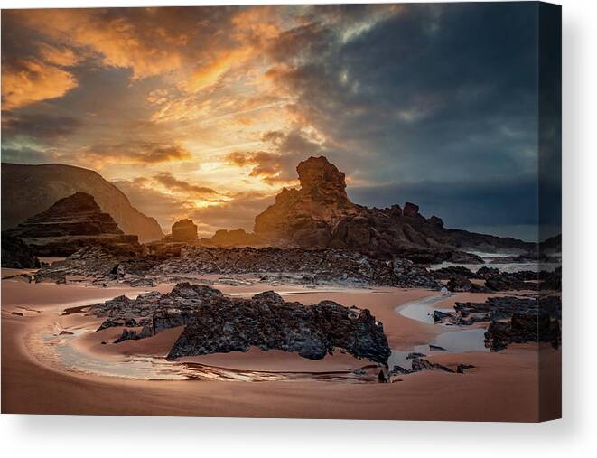 Castelejo Canvas Print featuring the photograph Stormy evening on Praia do Castelejo by Dmytro Korol