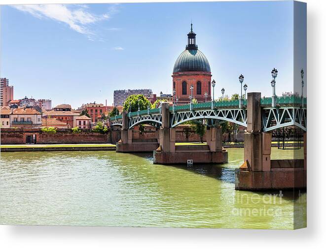 Toulouse Canvas Print featuring the photograph St.Pierre bridge in Toulouse by Elena Elisseeva