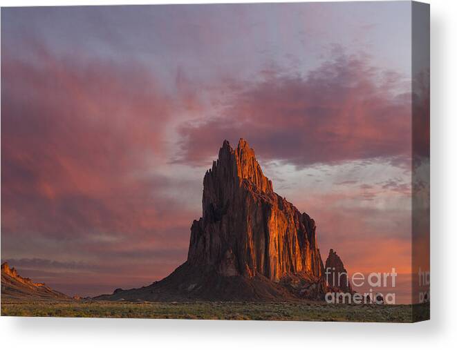 Shiprock Canvas Print featuring the photograph Sunrise at Shiprock New Mexico by Keith Kapple