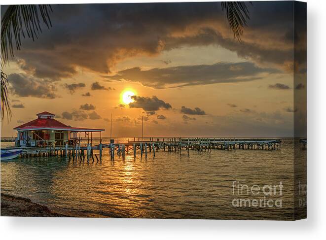 Sunrise Pier Canvas Print featuring the photograph Sunrise Pier over Water by David Zanzinger