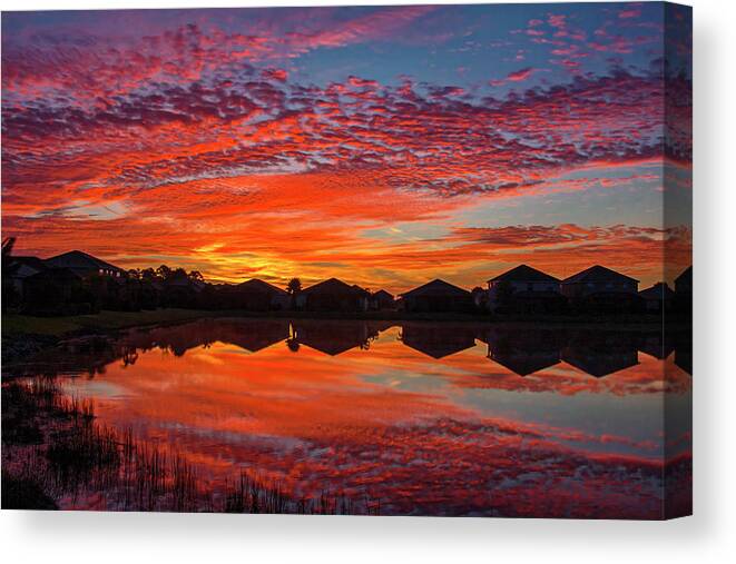 Sunrise Over Pond Canvas Print featuring the photograph Sunrise Reflections by Sally Weigand