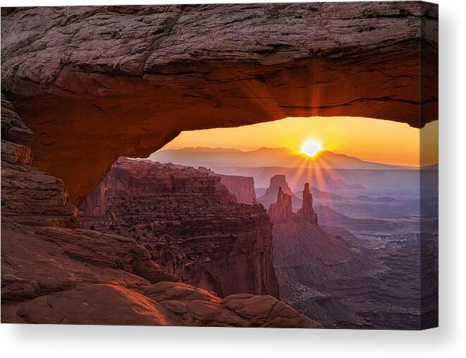 Mesa Arch Canvas Print featuring the photograph Sunrise through Mesa Arch by Andrew Soundarajan
