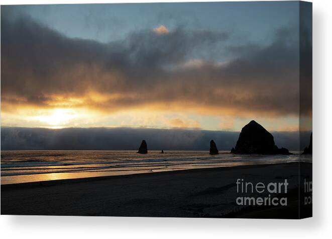 Sunset Canvas Print featuring the photograph Sunset at Cannon Beach by Sandra Bronstein
