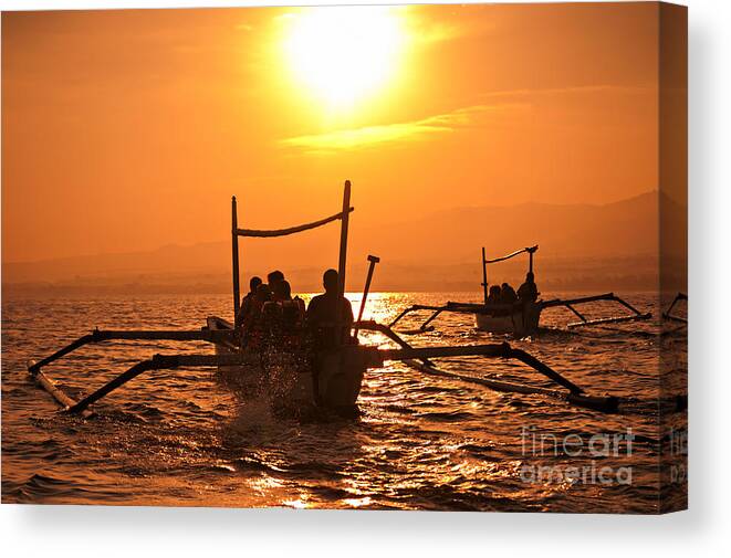 Sunset Canvas Print featuring the photograph Sunset At Sea Indonesia by Andy Maryanto