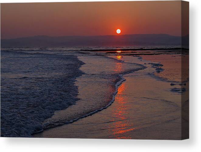 Exmouth Beach Devon Canvas Print featuring the photograph Sunset over Exmouth beach by Pete Hemington