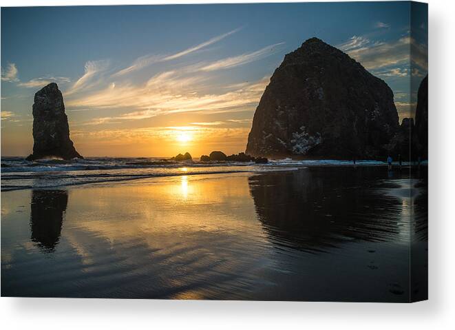 Haystack Rock Canvas Print featuring the photograph Sunset Stacks by Kristopher Schoenleber