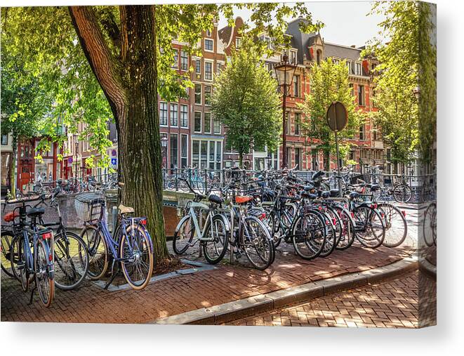 Spring Canvas Print featuring the photograph The Bicycles of Amsterdam by Debra and Dave Vanderlaan